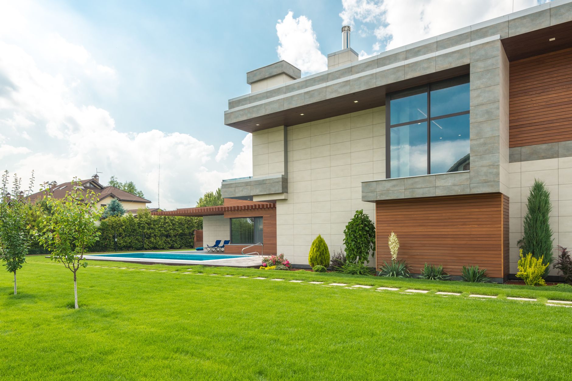 Exterior of a sleek modern home with pool on Tierra Verde