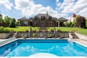 Exterior of a waterfront estate with pool on Pasadena Point near Tierra Verde