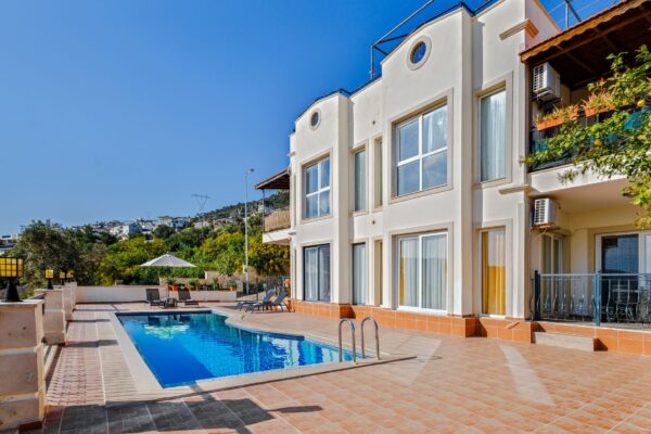 Exterior of a luxury villa with pool and water views on Tierra Verde